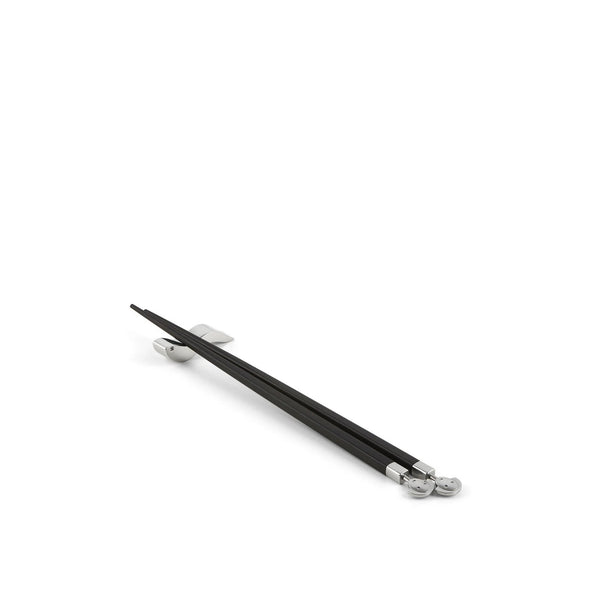 Anna Stick & Alessandro Stick – Bacchette in ebano con supporto da tavola firmate Alessandro Mendini